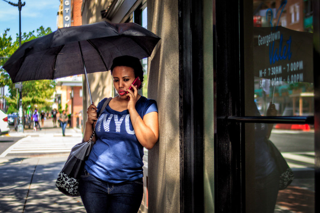 Phone-Conversation-under-a-Parasol-1024x683.jpg